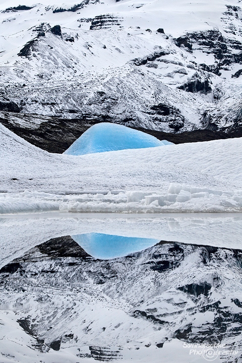 Blue Iceberg Reflection