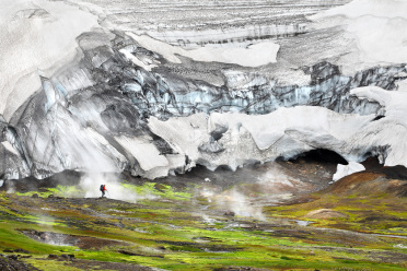 Hiker near Ice Caves in the Highlands