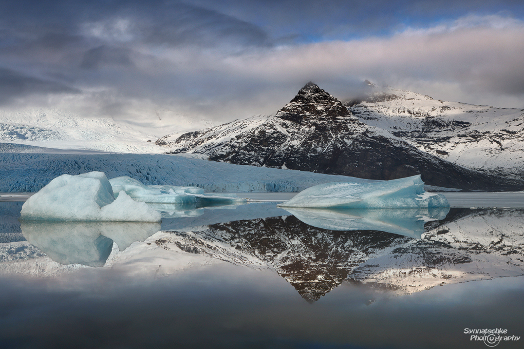 Icebergs and reflection