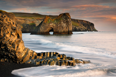 Sea arch sunset