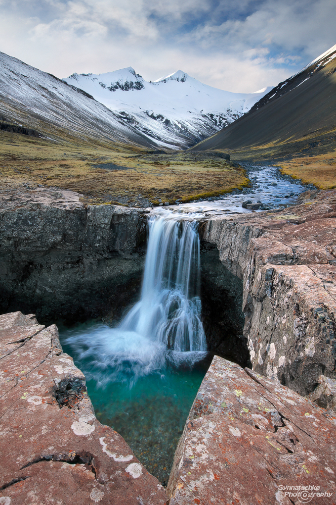 Waterfall in a remote valley in Southern Iceland