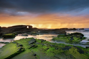 Green Rocks and Thunderstorm at the Playa de las Catedrales