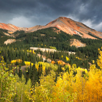 Red Mountain surrounded by fall foliage