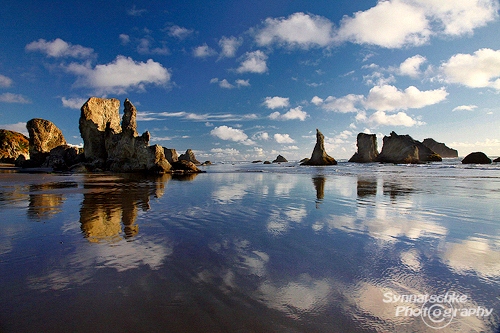 Face Rock Beach Reflection