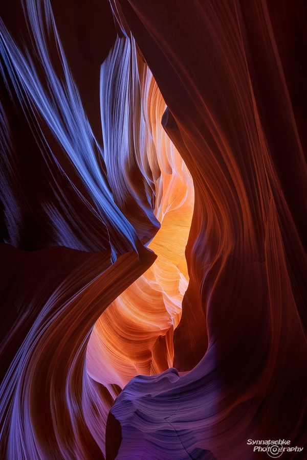 Rainbow-colored slot canyon